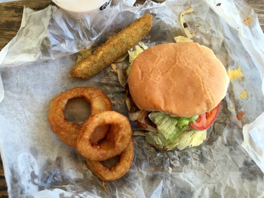 Cheeseburger, onion rings and fried pickle at Pirate's Cove.